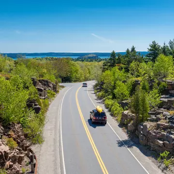 Driving through Acadia National Park, Maine. Allard1/Getty Images