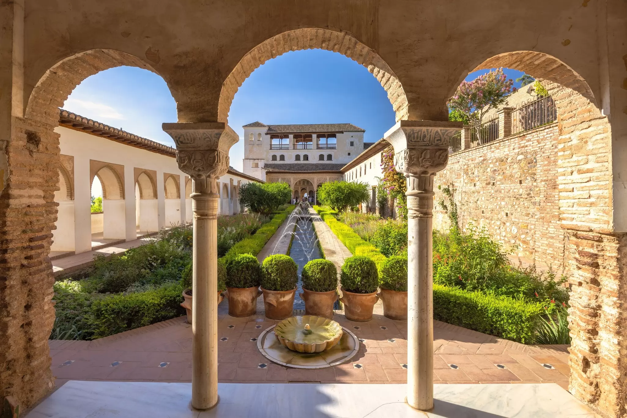 The Patio de la Acequia, courtyard of the Generalife palace at the Alhambra complex in Granada town, Andalusia, Spain. Serene courtyard garden with fountain and classical architecture., License Type: media, Download Time: 2025-12-23T20:43:03.000Z, User: rhylton_redventures, Editorial: false, purchase_order: 65050 - Digital Destinations and Articles, job: Lonely Planet , client: Journeys, other: Rhianydd Hylton