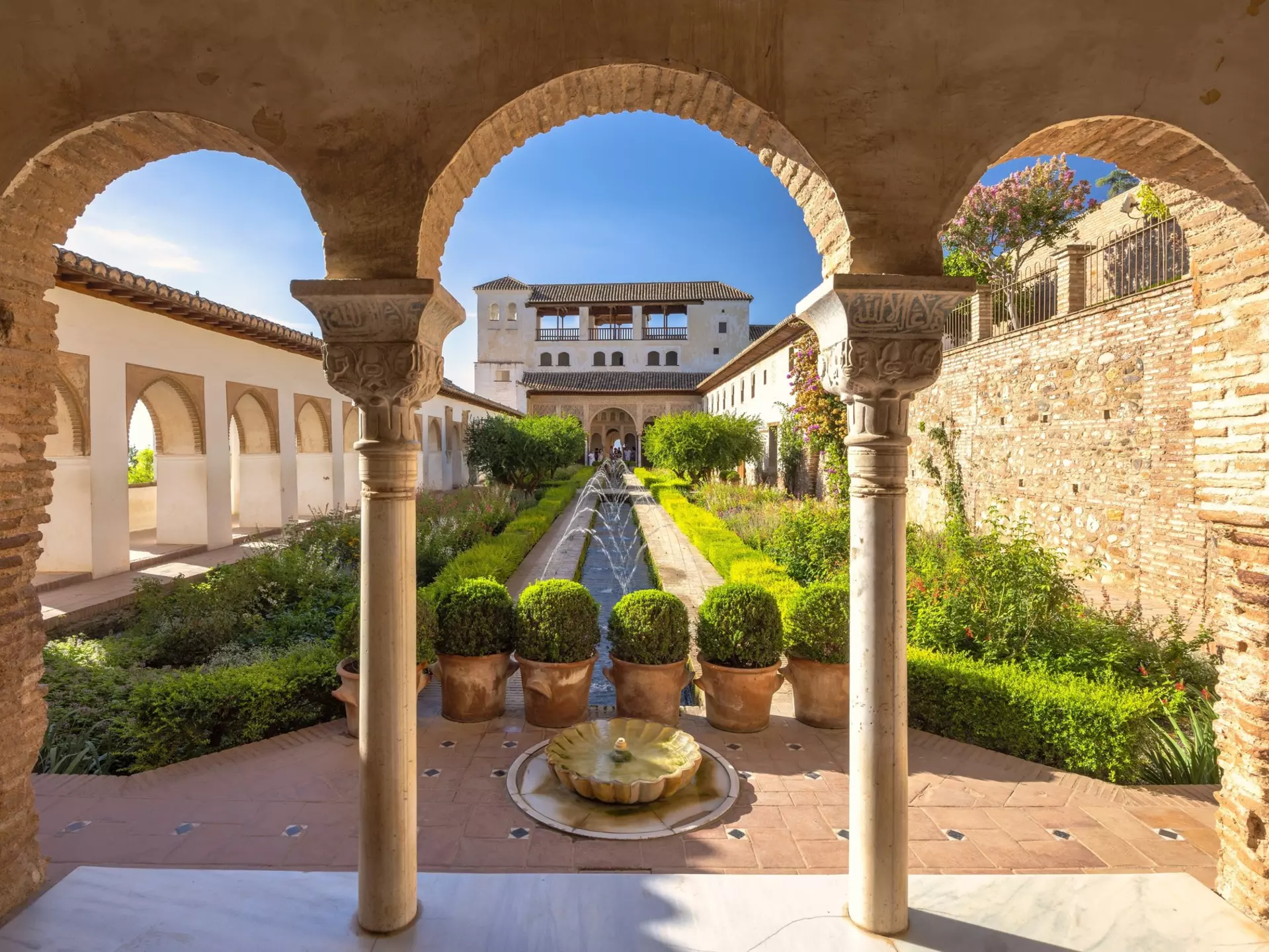 The Patio de la Acequia, courtyard of the Generalife palace at the Alhambra complex in Granada town, Andalusia, Spain. Serene courtyard garden with fountain and classical architecture., License Type: media, Download Time: 2025-12-23T20:43:03.000Z, User: rhylton_redventures, Editorial: false, purchase_order: 65050 - Digital Destinations and Articles, job: Lonely Planet , client: Journeys, other: Rhianydd Hylton