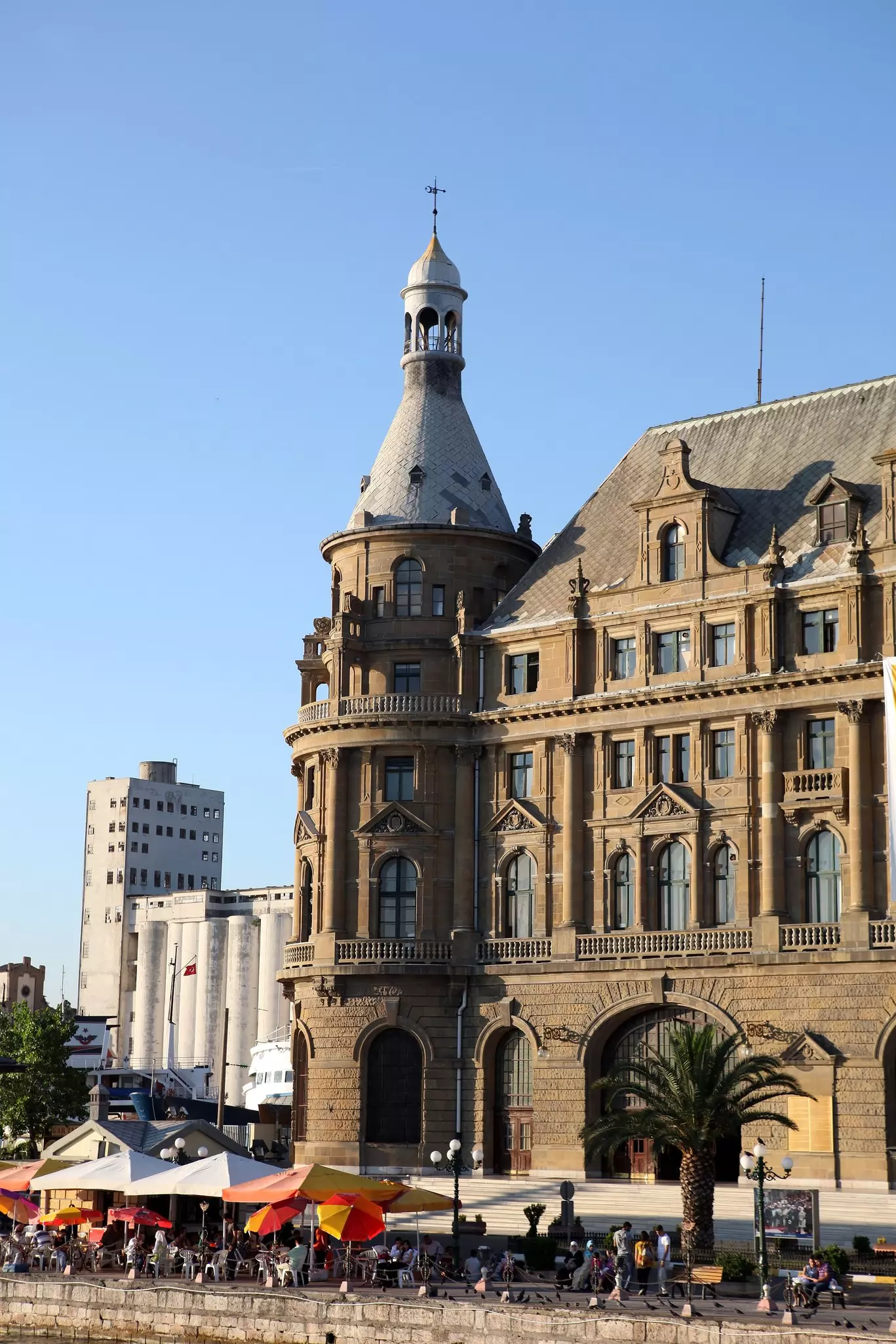A large stone building with a rounded tower on one corner