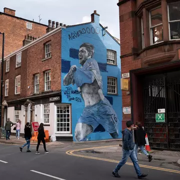 2FWG7WN Manchester, UK, 22rd May 2021. A new mural of Manchester City footballer Sergio Aguero is seen in Manchesters Northern Quarter the day before the team are presented with the English Premier League trophy, Manchester, UK. Aguero has agreed to sign for Barcelona on a two-year contract when his Manchester City deal expires next month. Credit: Jon Super/Alamy Live News.