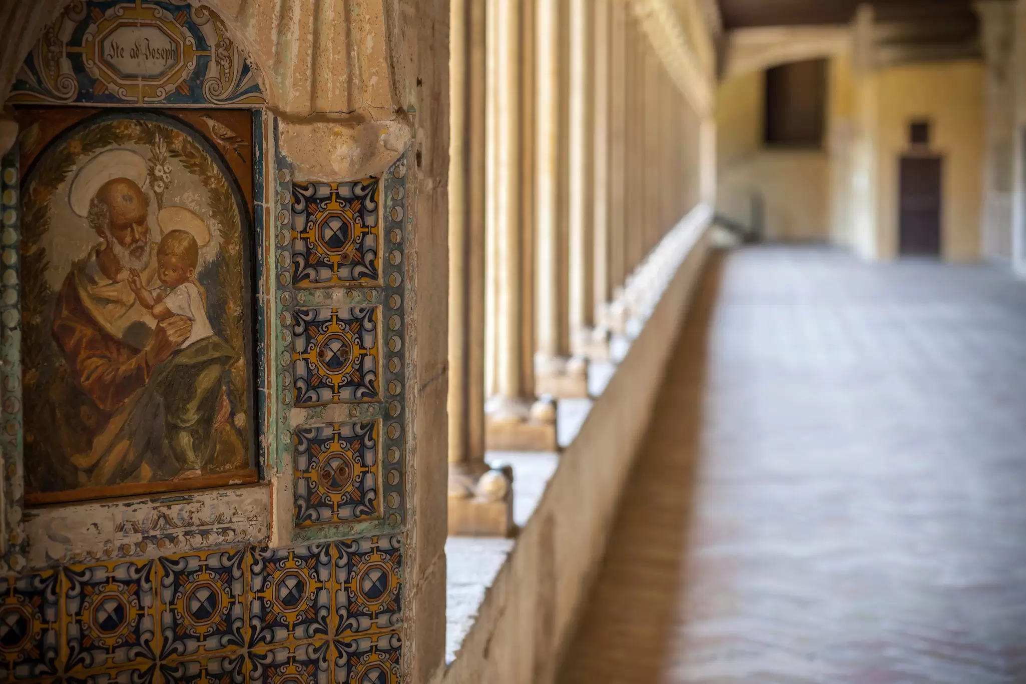 Tile work and religious imagery at a monastery in Pedralbes.