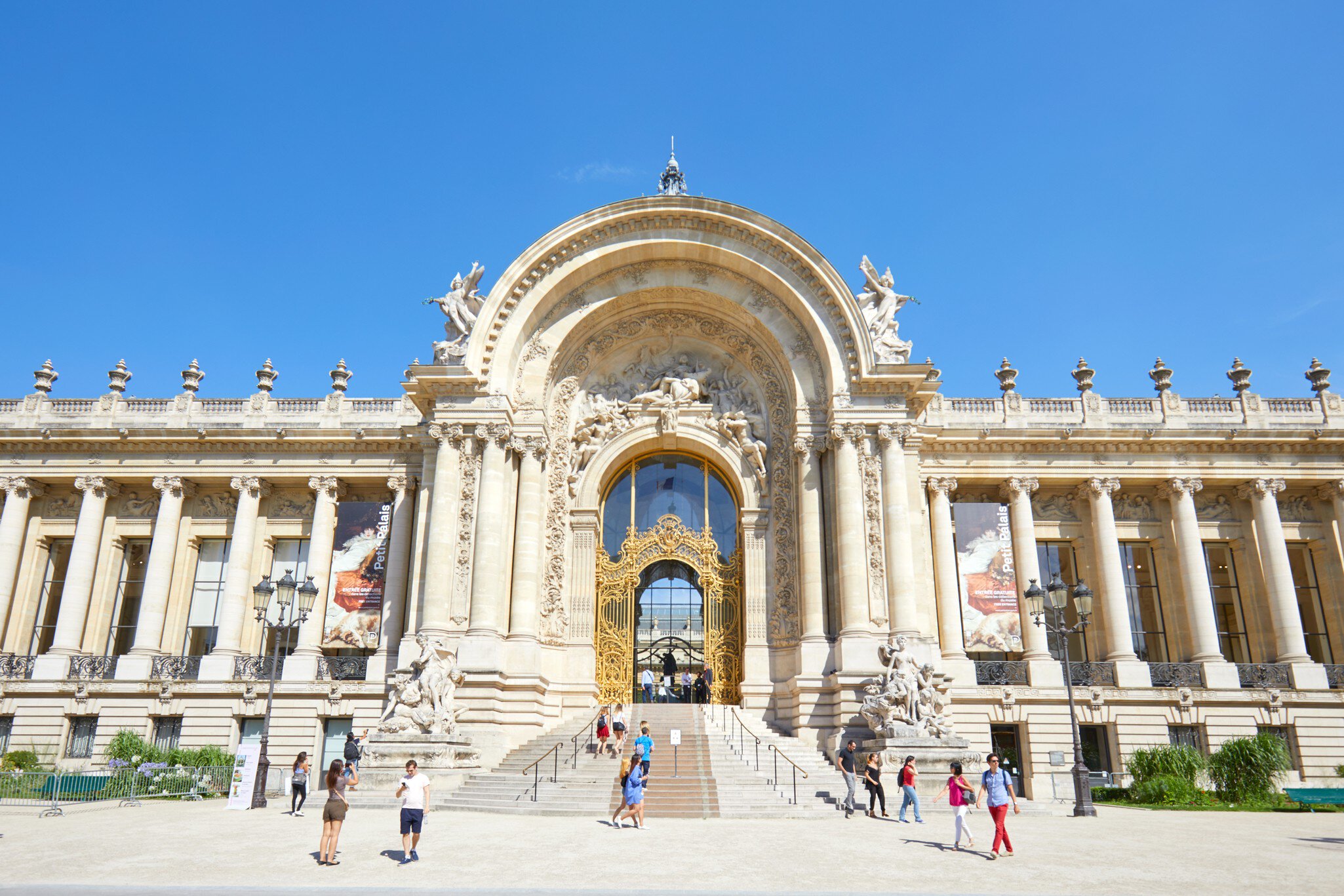 PARIS, FRANCE - JULY 21, 2017: Petit Palais building and people walking in a sunny summer day, clear blue sky in Paris, France., License Type: media, Download Time: 2025-07-14T16:45:45.000Z, User: mvm_lonelyplanet, Editorial: true, purchase_order: 56530 - Guidebooks, job: Paris 15, client: Global Publishing-WIP, other: Virginia Moreno