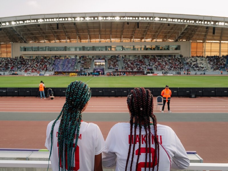 Two young girls enter the stadium for the Final match between Morocco and Nigeria at the 2024 Women’s Africa Cup of Nations.

For World Cup photo essay
