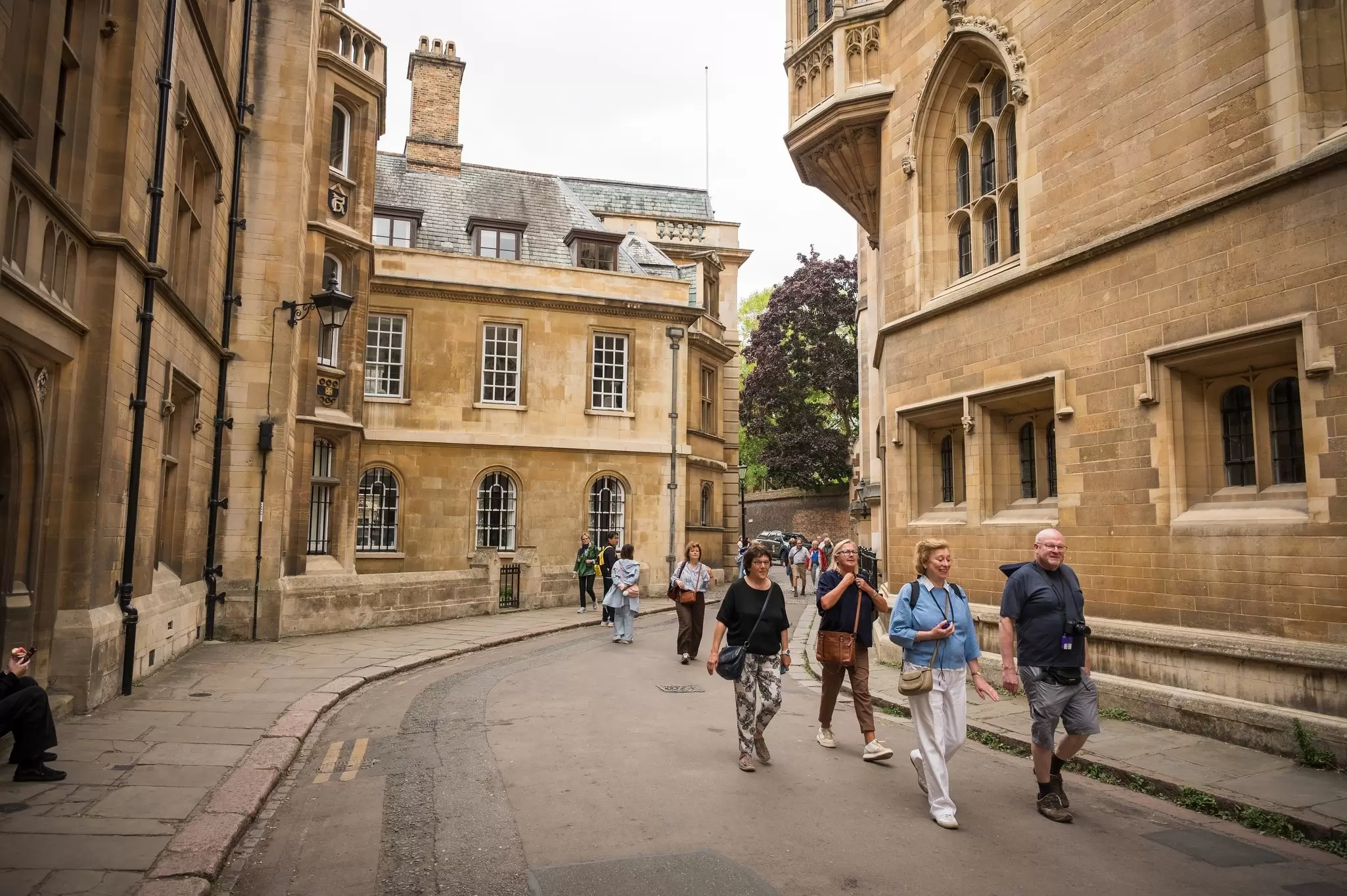 Tourists walking down Trinity Lane behind The King’s College Chapel at Cambridge University in the UK.