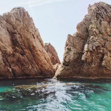 Rock Formation In Sea
2015; Beauty In Nature; Color Image; Day; Geology; Horizontal; Idyllic; Nature; No People; Non-Urban Scene; Outdoors; Photography; Remote; Rock - Object; Rock Formation; Scenics; Sea; Sky; Spain; Tossa De Mar; Tranquility; Water; Waterfront;