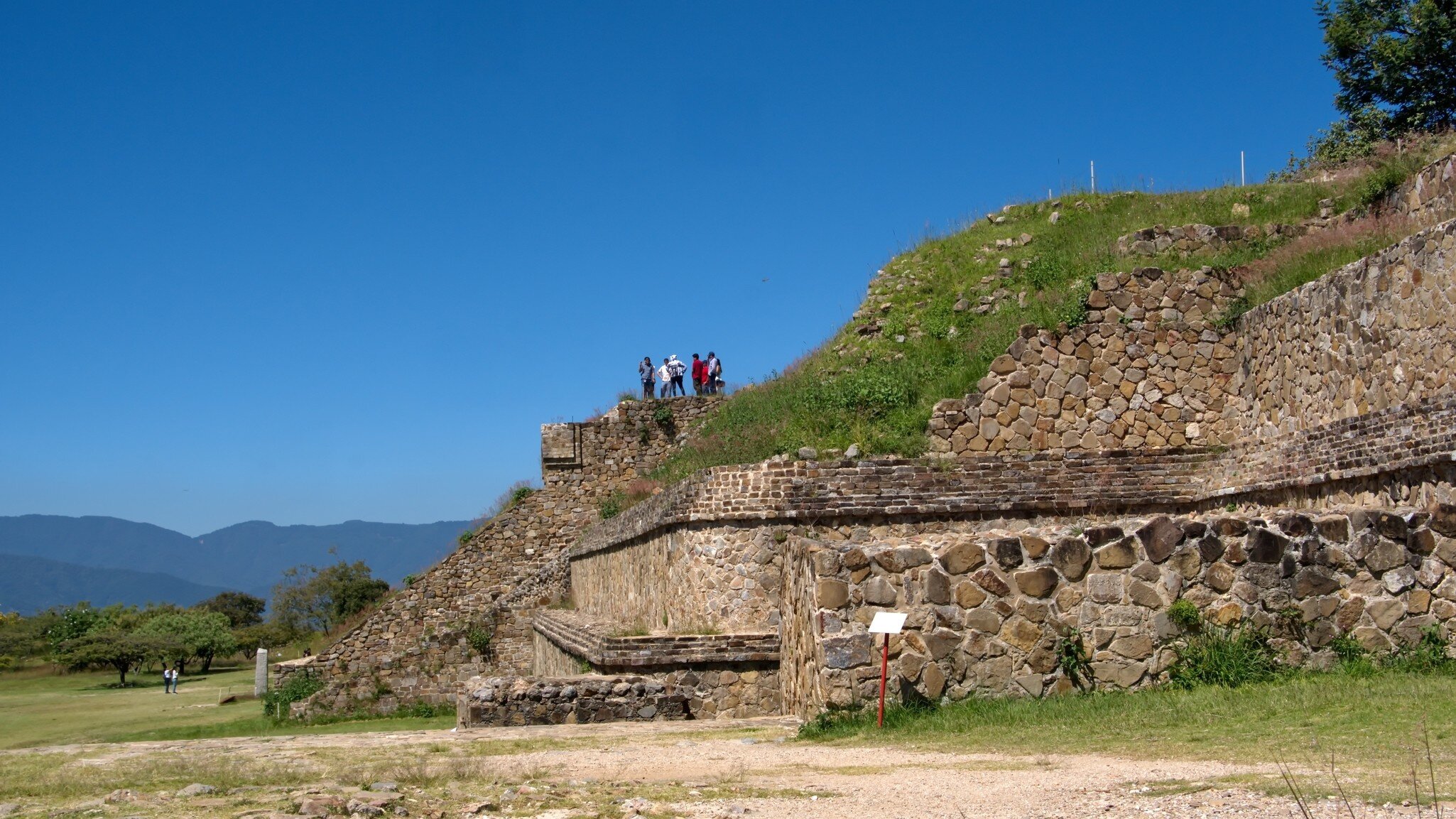 OAXACA, MEXICO - OCTOBER 4, 2022:  Tourists on the South Platform in Monte Alban; Shutterstock ID 2304509683;