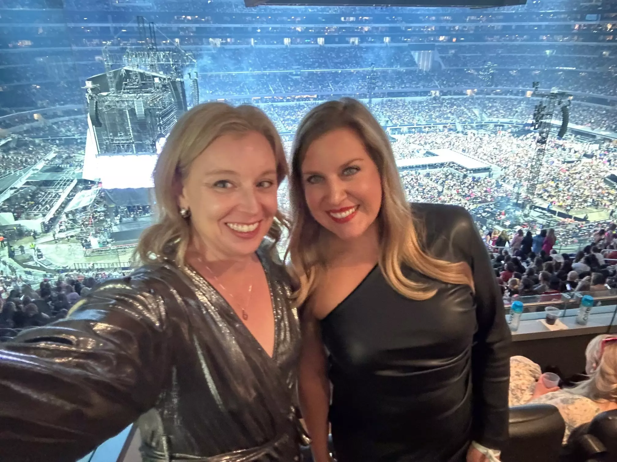 Lonely Planet Senior Editor Melissa Yeager and friend Maggie Crane at Taylor Swift Eras Tour, AT&T Stadium in Arlington, Texas. © Melissa Yeager/Lonely Planet