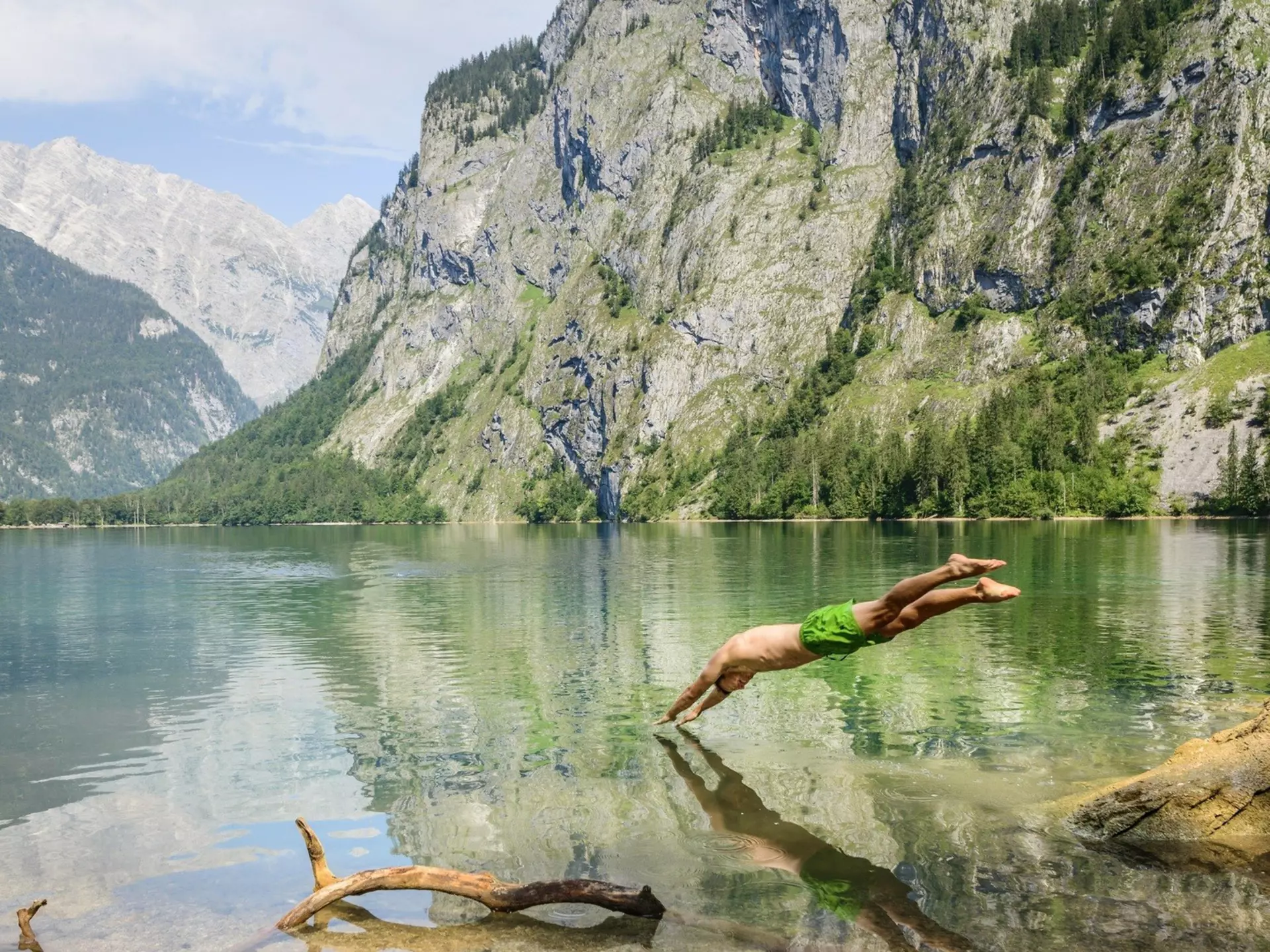Diving into the Obersee, the Bavarian Alps. Valentin Wolf/Getty Images