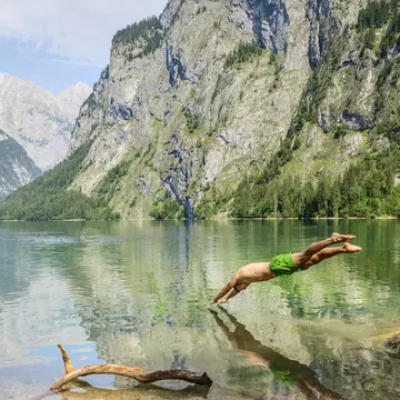 Diving into the Obersee, the Bavarian Alps. Valentin Wolf/Getty Images