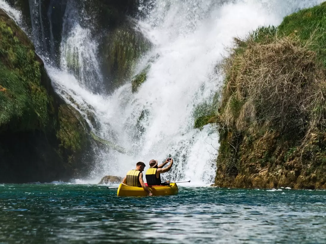 The idyllic Kravica Waterfall provides cool relief from the sweltering summer heat © Getty Images