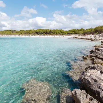 View of the water at Platges de Son Saura on the island of Menorca, Spain.