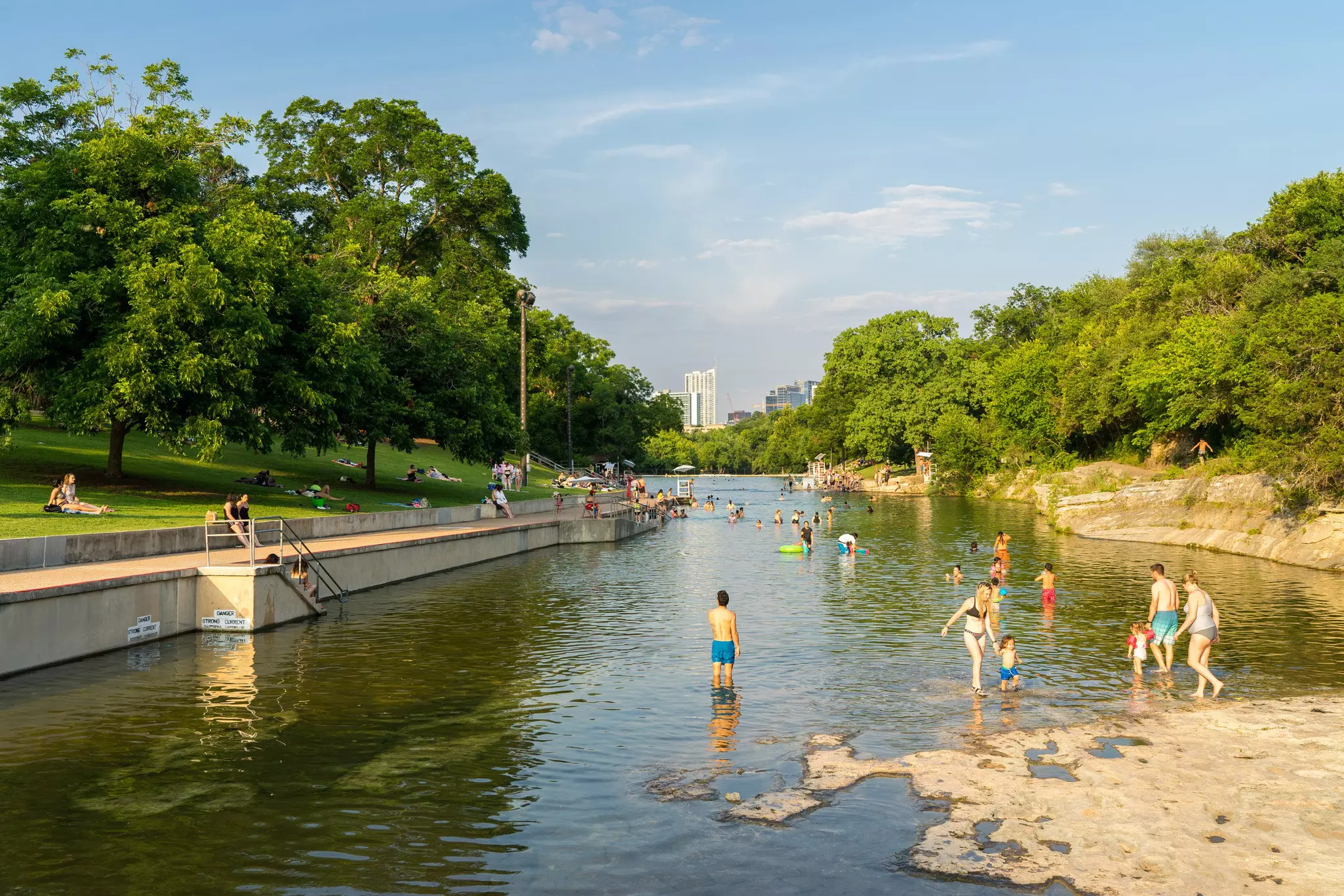 JULY 2017: Swimmers at the Barton Springs pool in Austin.
699688678
austin, austin texas, barton creek, barton springs, barton springs austin, blue water, camp, creek, lifeguard, lifeguard tower, natural springs, pool, pool party, safety, springs, summer, summer camp, summer camp kids, summer time, summer vacation, swimmers, swimming, swimming classes, swimming lessons, texas, tourism, tourists, vacation, water