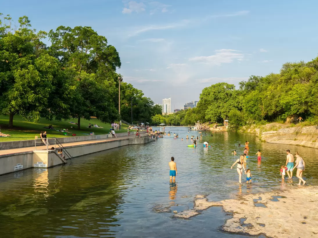 Swimmers at the Barton Springs pool in Austin