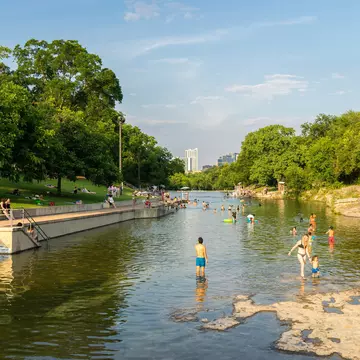 Swimmers at the Barton Springs pool in Austin