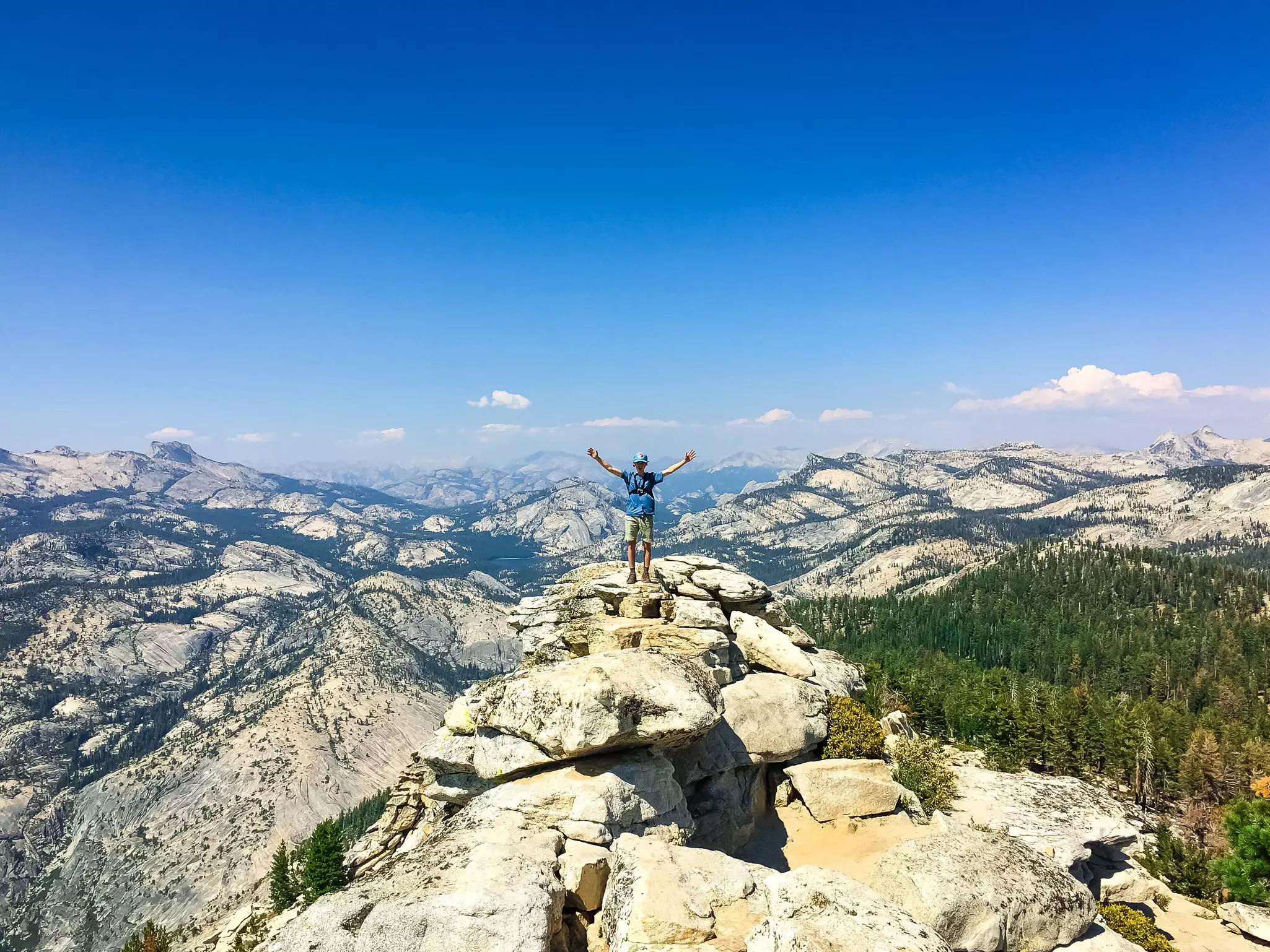 A man stands on the summit of Clouds Rest at Yosemite National Park.
1170865357
accomplishment, achieve, adventure, alpine, backpack, beautiful, blue, challenge, cliff, climb, climbing, clouds, determined, drop off, earth, endless, evergreen, expedition, forest, granite, high, hike, hiking, landscape, mountain, mountain climbing, mountains, nature, outdoor, outdoor activities, outdoor advertising, outdoor sports, panoramic, peak, rock, scary, scenic, sky, steep, success, top, tourism, travel, valley, view, yosemite