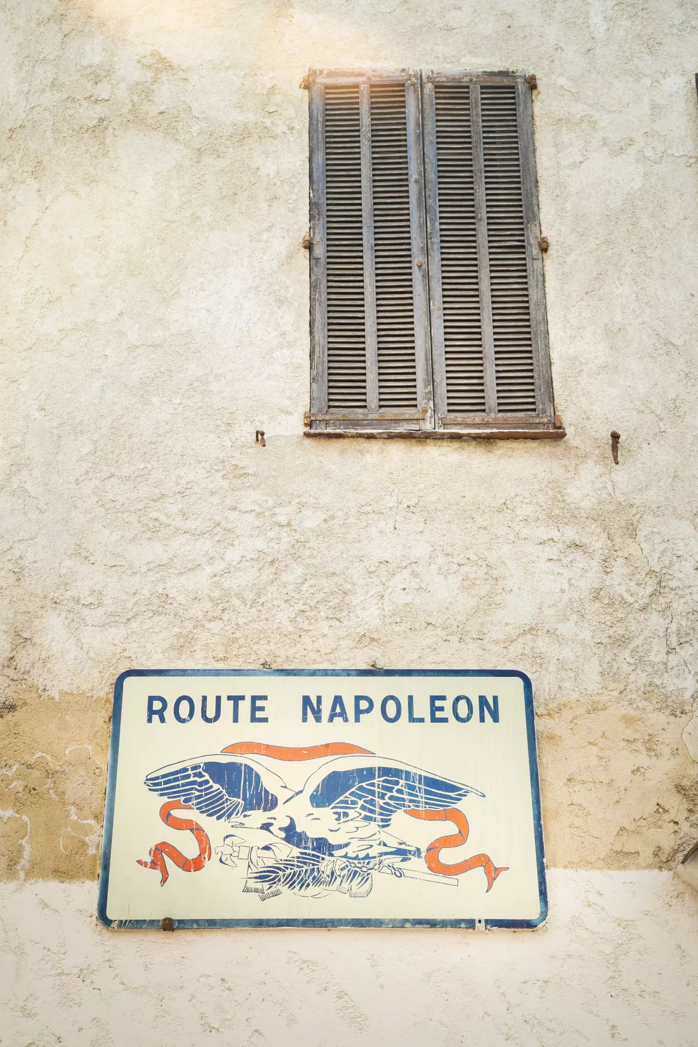 A sign at the official starting point of the Route Napoléon in the beach town of Golfe-Juan. Philip Lee Harvey / Lonely Planet