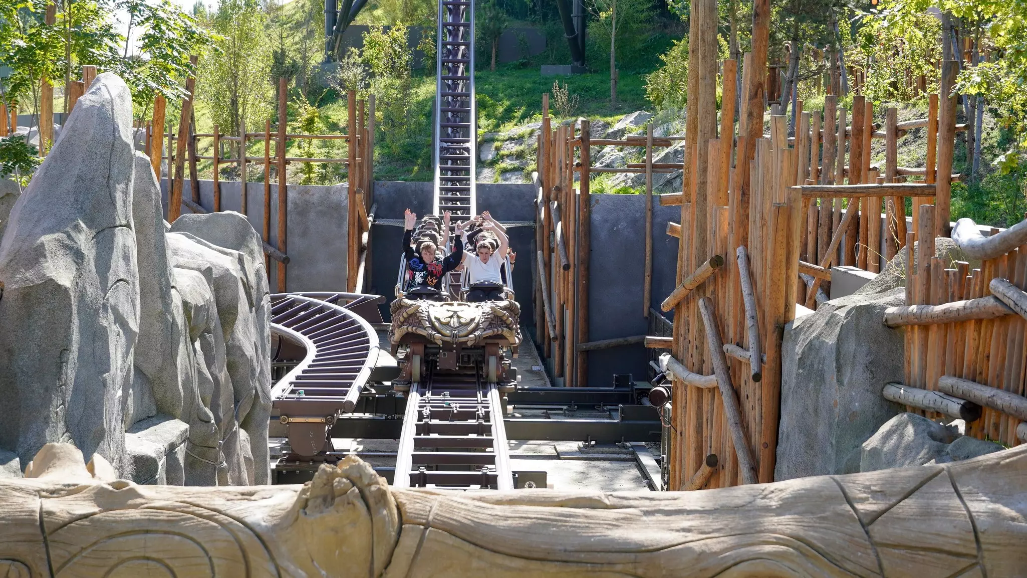 Young people have fun on the 'Toutatis' extreme launch roller coaster' in the Asterix theme park, France
