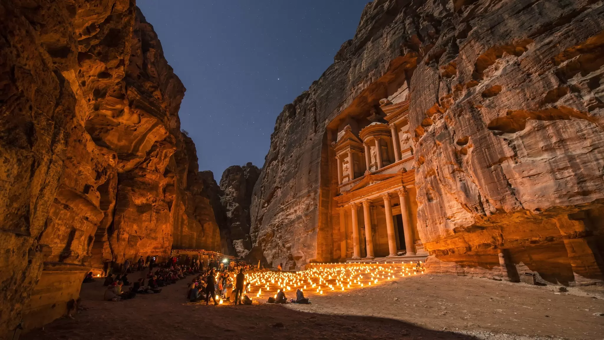 The Treasury in the ancient city of Petra bathed in candlelight. Paul Biris/Getty Images