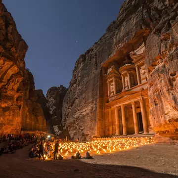The Treasury in the ancient city of Petra bathed in candlelight. Paul Biris/Getty Images