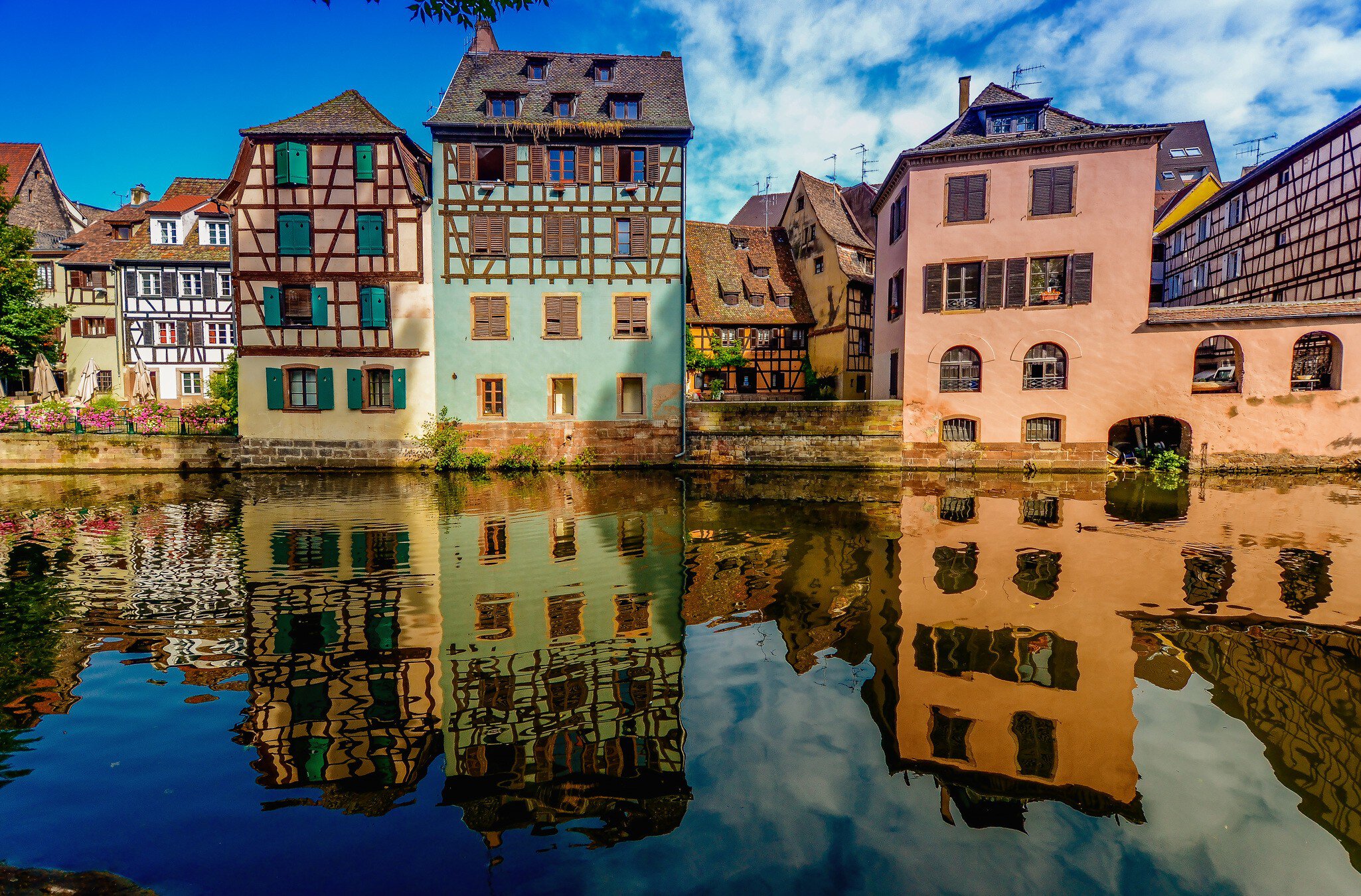 Residential buildings by canal, Strasbourg, Alsace region, France