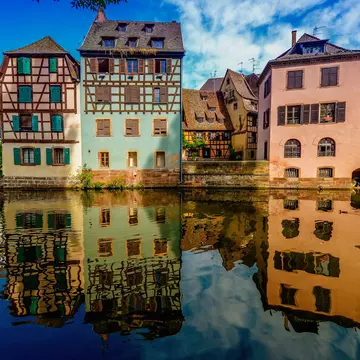 Residential buildings by canal, Strasbourg, Alsace region, France