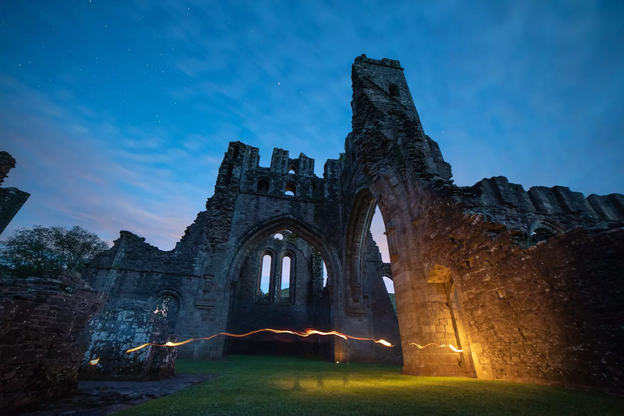 Starry night sky over Llanthony Priory.