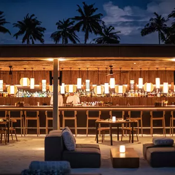 Brasa restaurant at the Patina Maldives, Fari Islands resort. fivetonine/Shutterstock