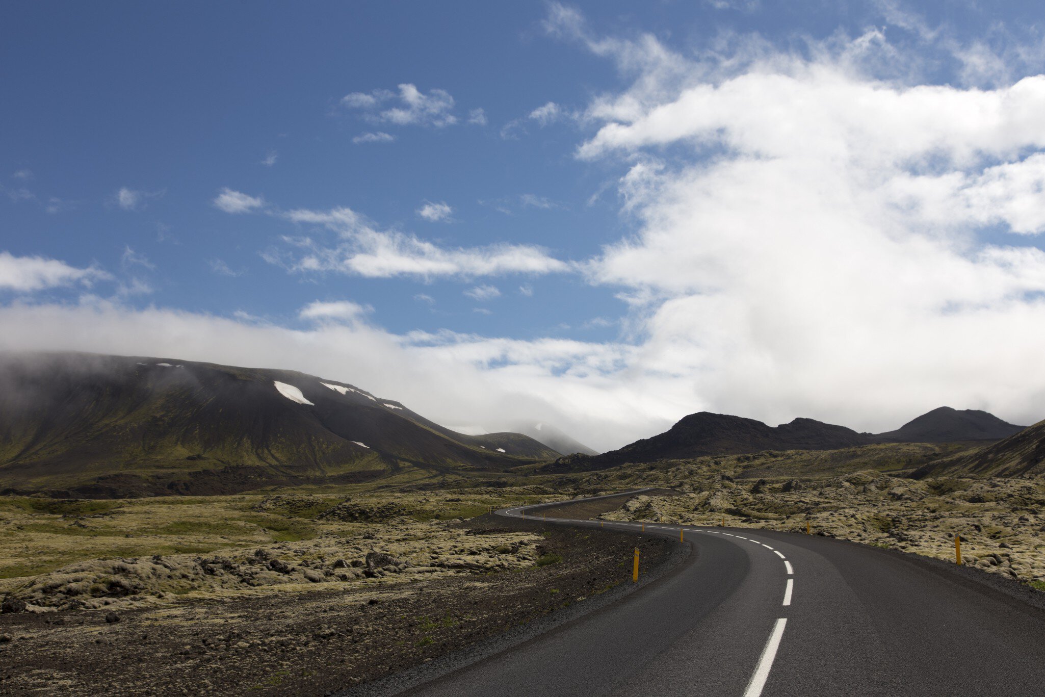 Dark volcanic terrain in ReykjanesfÃ³lkvangur park