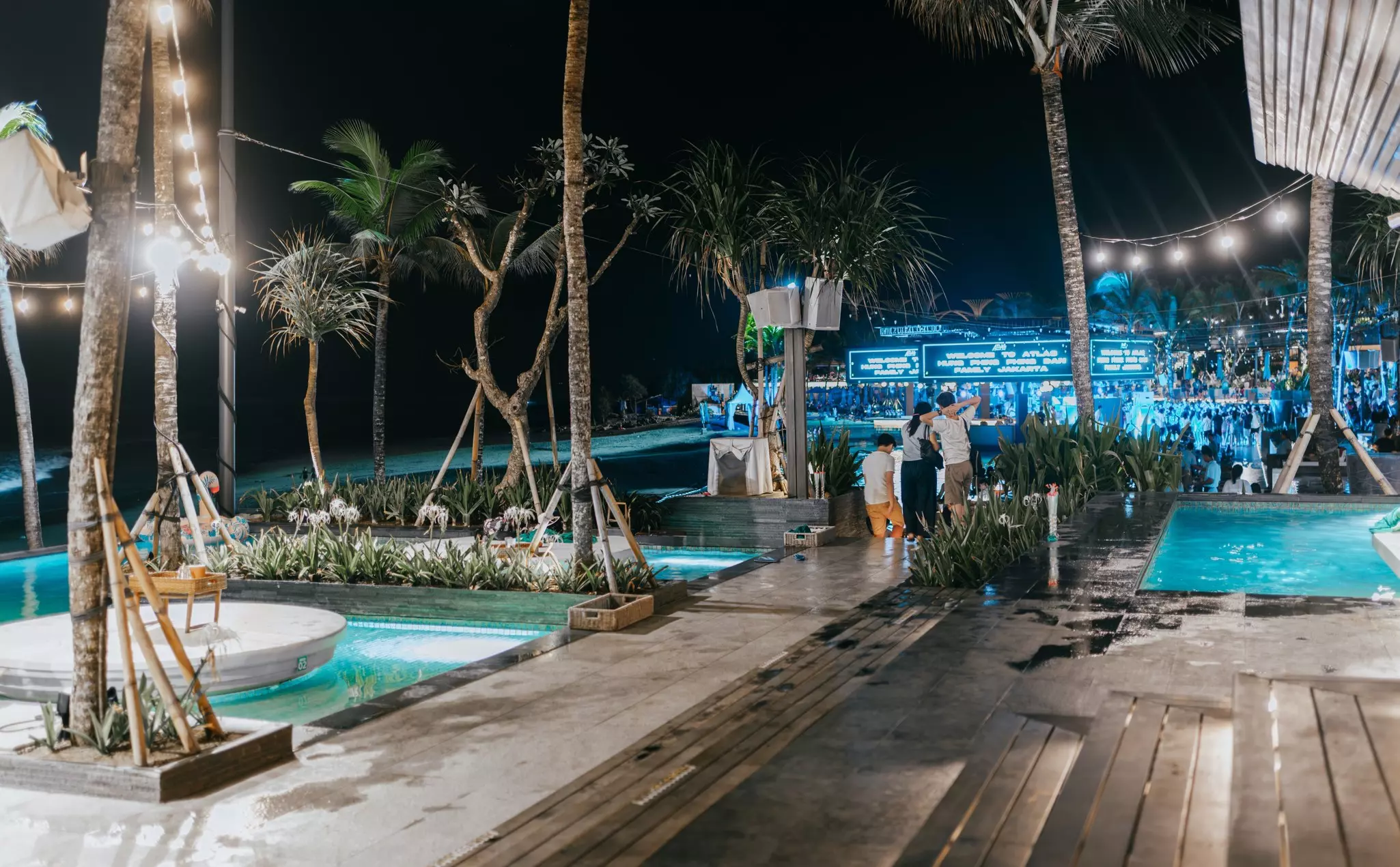 Atlas beach club, Bali, Indonesia, April 24, 2023 - Selective focus. Atmosphere of the Atlas Bali beach club at night. Holiday and night party concept.