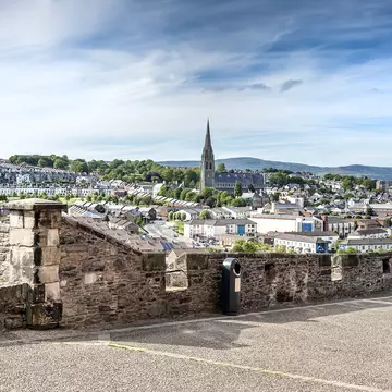 The skyline of Derry with St Eugene's Cathedral near Free Derry Corner and the city wall