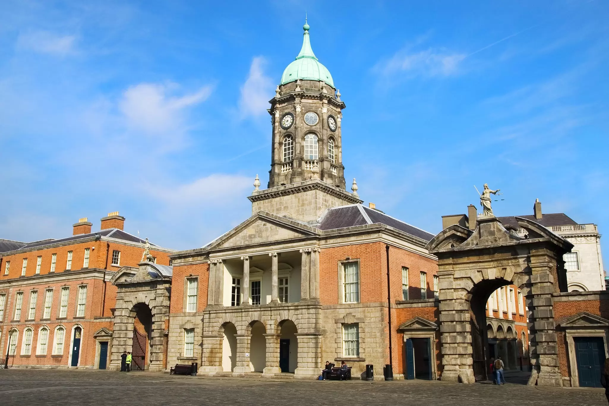 Ornate stone buildings and a clocktower