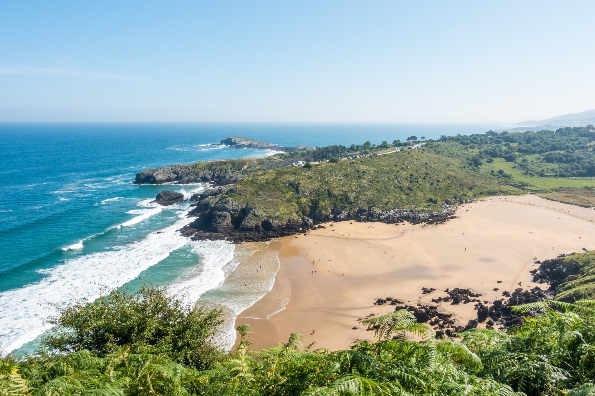 Aerial views of the Playa Sonabia while hiking the Camino de Santiago in Oriñon, Cantabria, Spain; Shutterstock ID 1382185505;