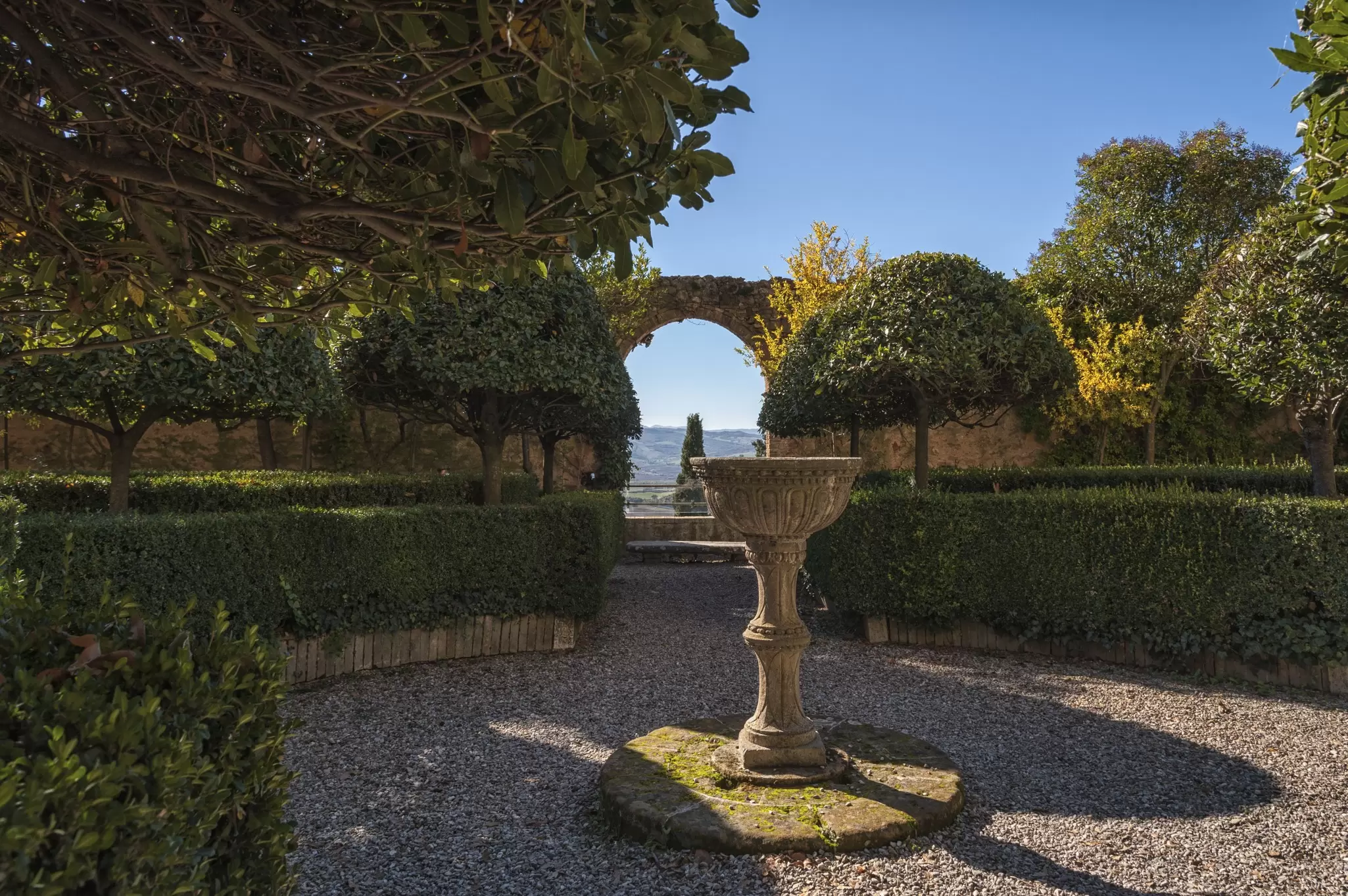 The beautiful Italian Renaissance garden of Piccolomini Palace, one of the first examples of Renaissance architecture in Pienza.