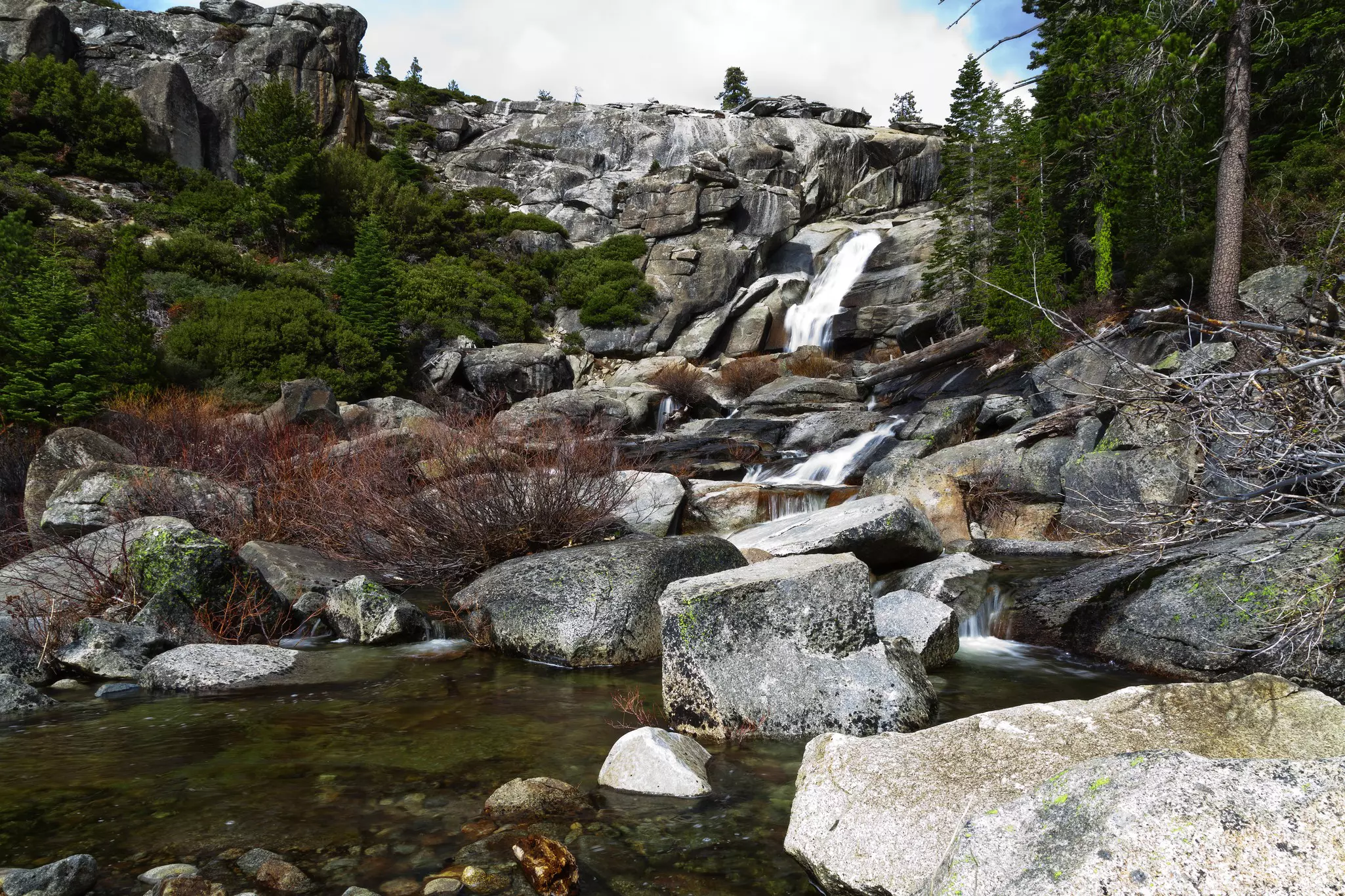 View of the top of Chilnualna Falls at Yosemite National Park