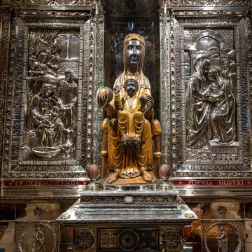 Montserrat, Catalonia, Spain - Oct 27, 2019: Wooden statue of the Virgin and Child, supposedly carved by St. Luke; in the Benedictine monastery of Santa María de Montserrat; Shutterstock ID 1618715806;
