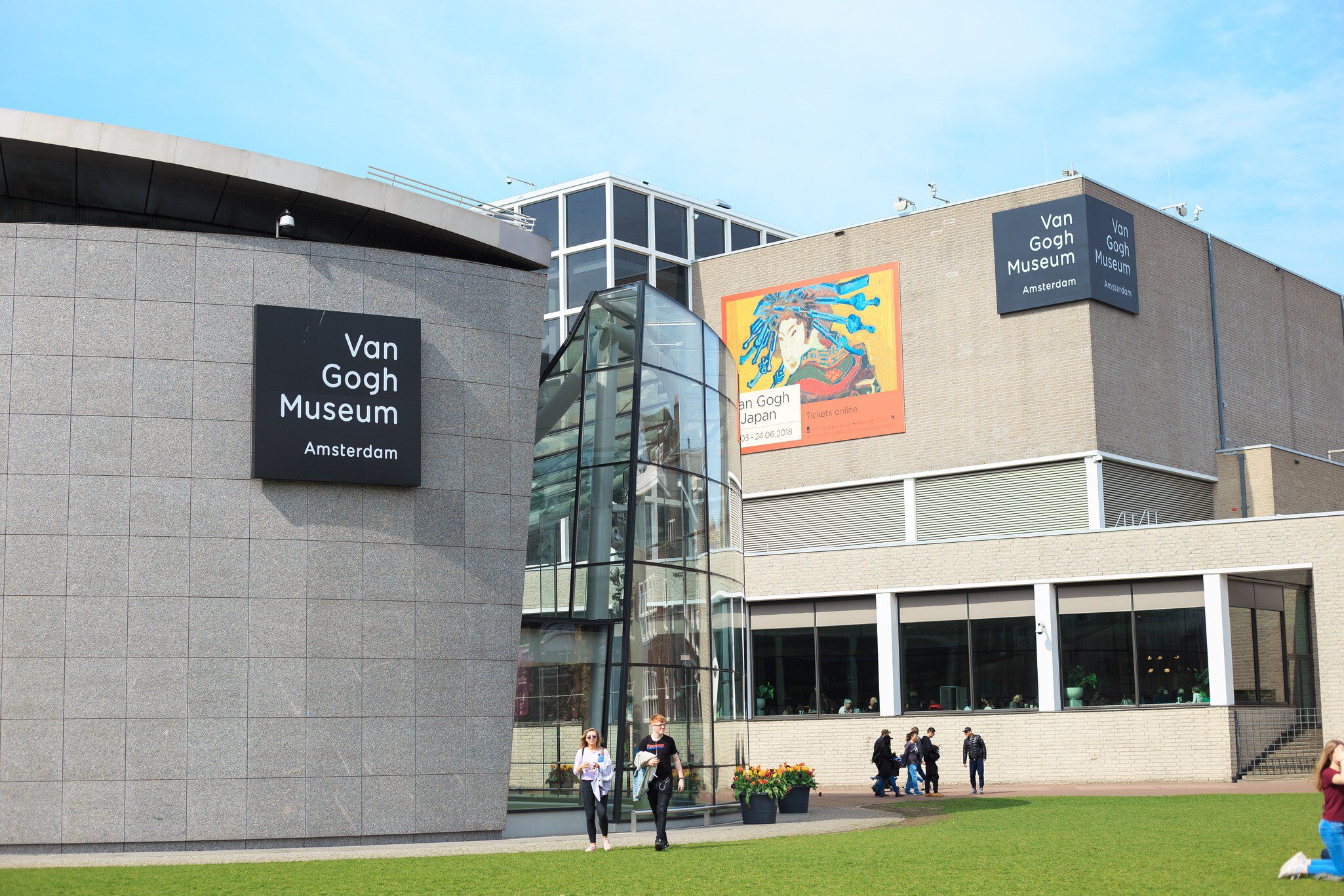 Exterior view of the Van Gogh Museum on a sunny day in Amsterdam.