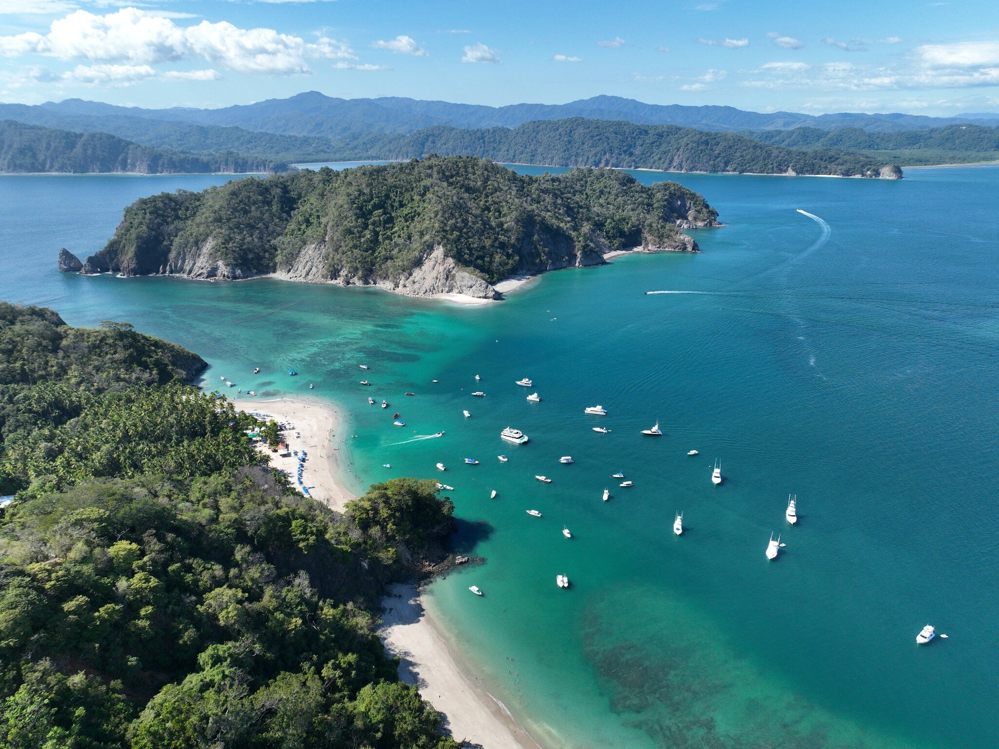 Serene Beauty of Isla Tortuga's Crystal-Clear Waters and Pristine Beaches in Stunning Costa Rica.