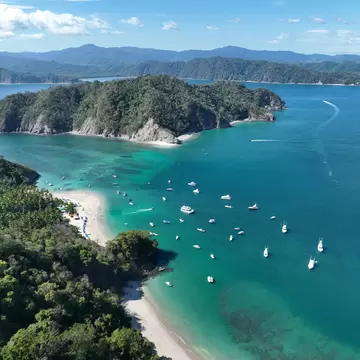 Serene Beauty of Isla Tortuga's Crystal-Clear Waters and Pristine Beaches in Stunning Costa Rica.