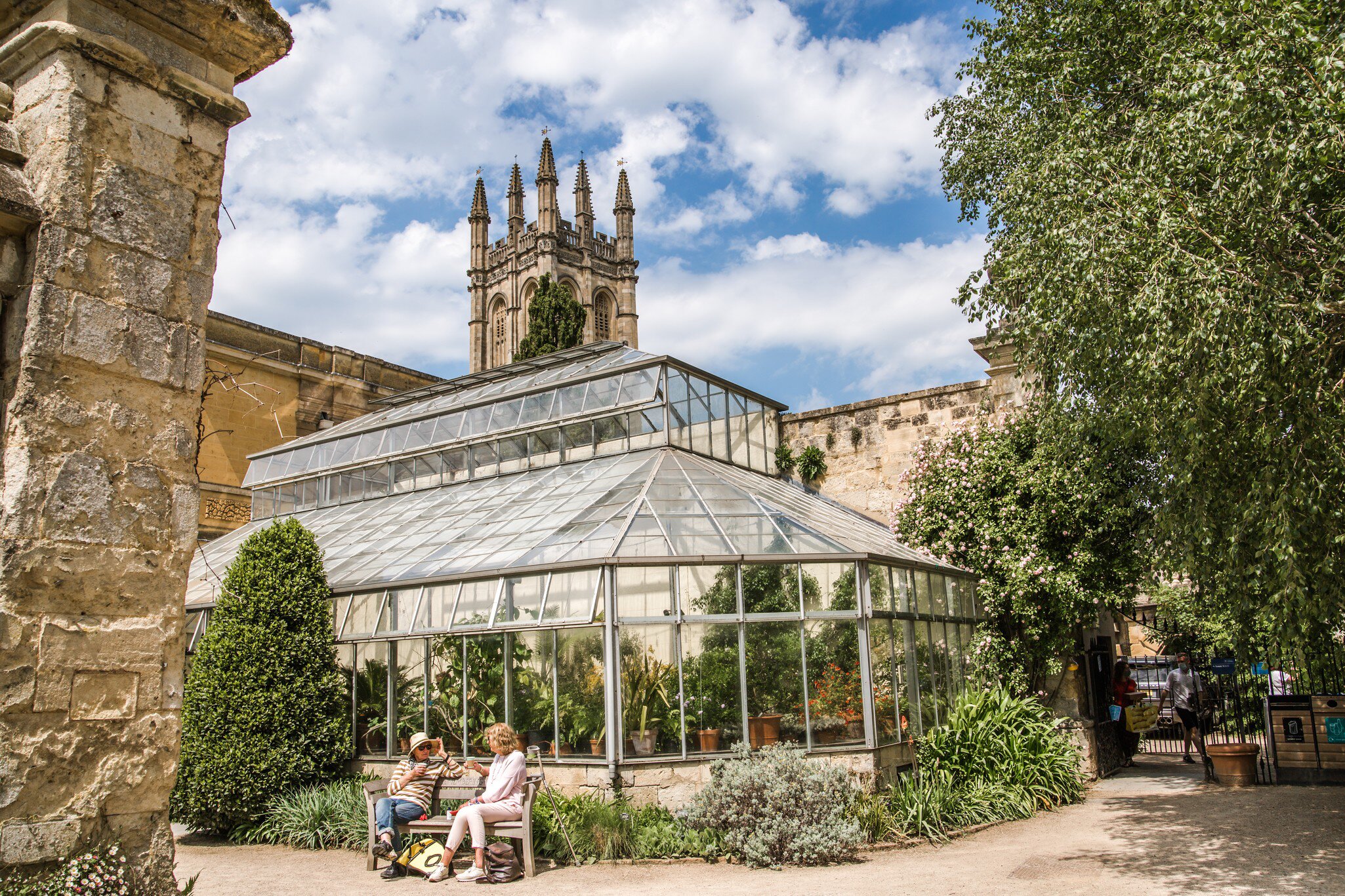 Oxford, UK - June2, 2021: Red poppies in Oxford Botanic garden (founded 1621),  and Magdalen college tower. Oxford University, License Type: media, Download Time: 2026-04-23T17:47:50.000Z, User: LP_ZRay, Editorial: true, purchase_order: 65050 - Digital Destinations and Articles, job: Lonely Planet, client: App Content, other: Zayira Ray
