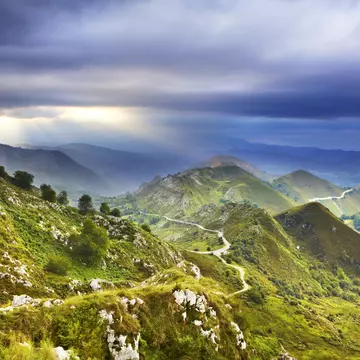 Overview of tracks winding through Picos de Europa mountains.