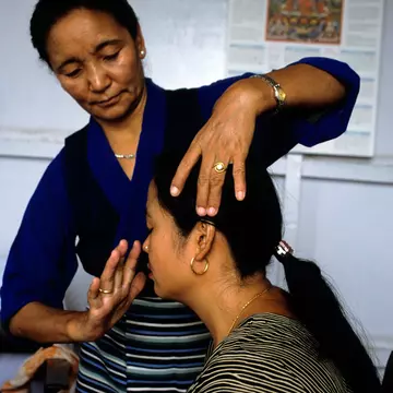 AHXFF9 Amchi Tibetan medicine doctor diagnosing patient in Men Tse khang Tibetan Medical Astro Institute Branch Clinic Boudhanath.
AHXFF9
Amchi, Tibetan, medicine, Men, Tse, khang, Boudhanath, traditional, medicine, diagnosis, healthcare, alternative, medicine, Nepal, Tibetan, Medical, Astro, Institute, Amchi, Tibetan, medicine, doctor, patient, Men, Tse, khang, Tibetan, Medical, Astro, Institute, Boudhanath, Nepal, diagnosis, traditional, medicine, healing, healthcare, alternative, medicine, holistic, wellness, treatment, examination, medical, clinic, practitioner, culture, heritage, Asian, medicine, woman, doctor, female, patient, therapy, spiritual, healing, ancient, wisdom, pulse, diagnosis, touching, head, forehead, concentration, care, compassion, professional, ethnic, traditional, dress, striped, shirt, long, hair, jewelry, watch, ring, poster, Buddhist, art, clinic, interior, health, service, medical, consultation, diagnostic, natural, medicine, Kathmandu
**RIGHTS MANAGED**