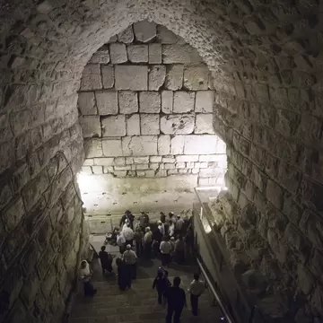 Tourists visit the site of excavations in the Western Wall tunnels, on October 22, 2009 in Jerusalem?s old city, during a tour organized by the Israeli Government Press Office to deny claims that the Israeli Antiquity Authority is conducting excav...