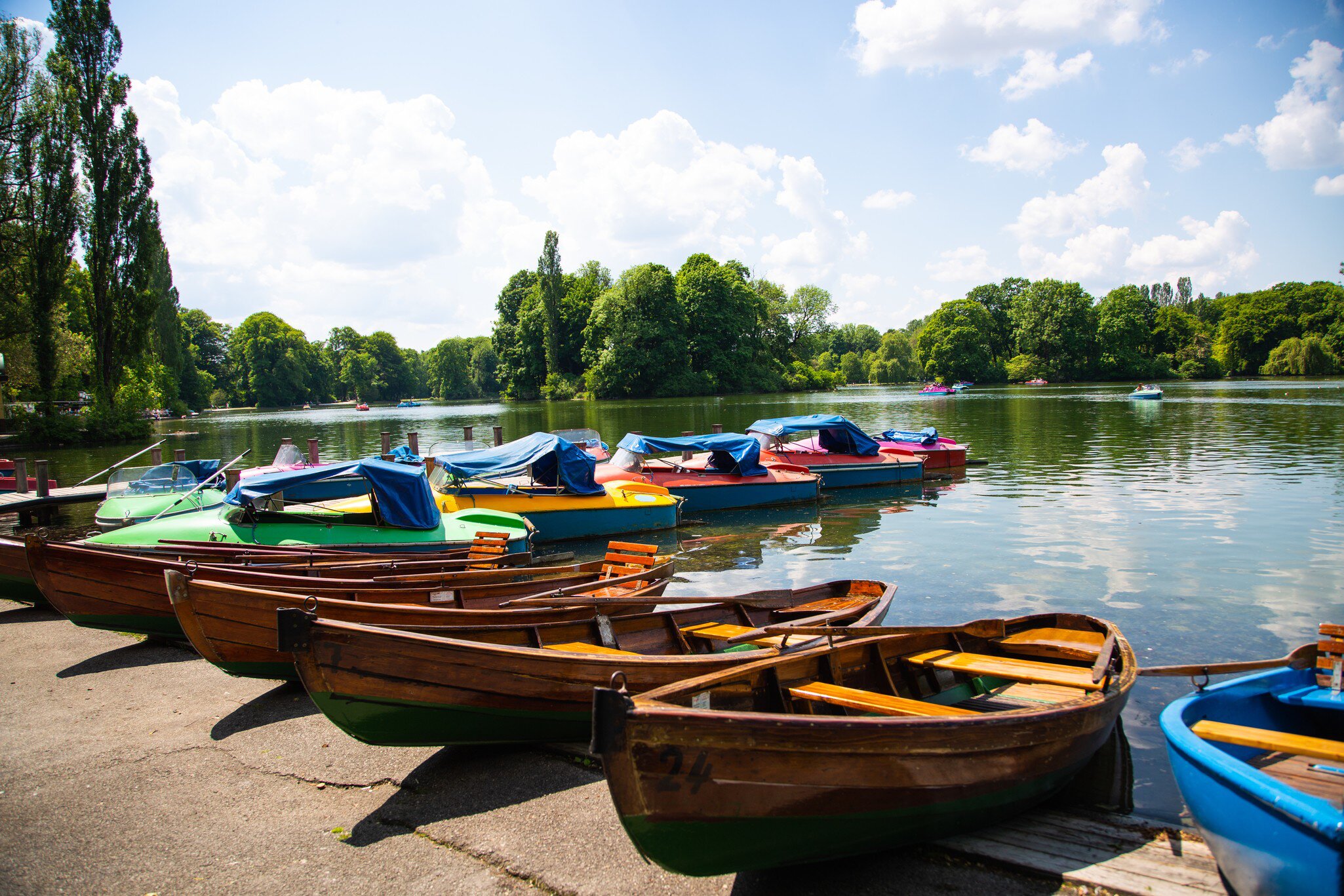 Pedal boats in the Kleinhesseloher See in the English Garden in Munich, Germany.