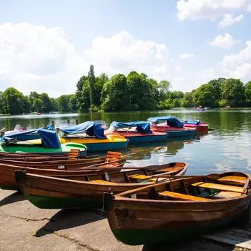 Pedal boats in the Kleinhesseloher See in the English Garden in Munich, Germany.