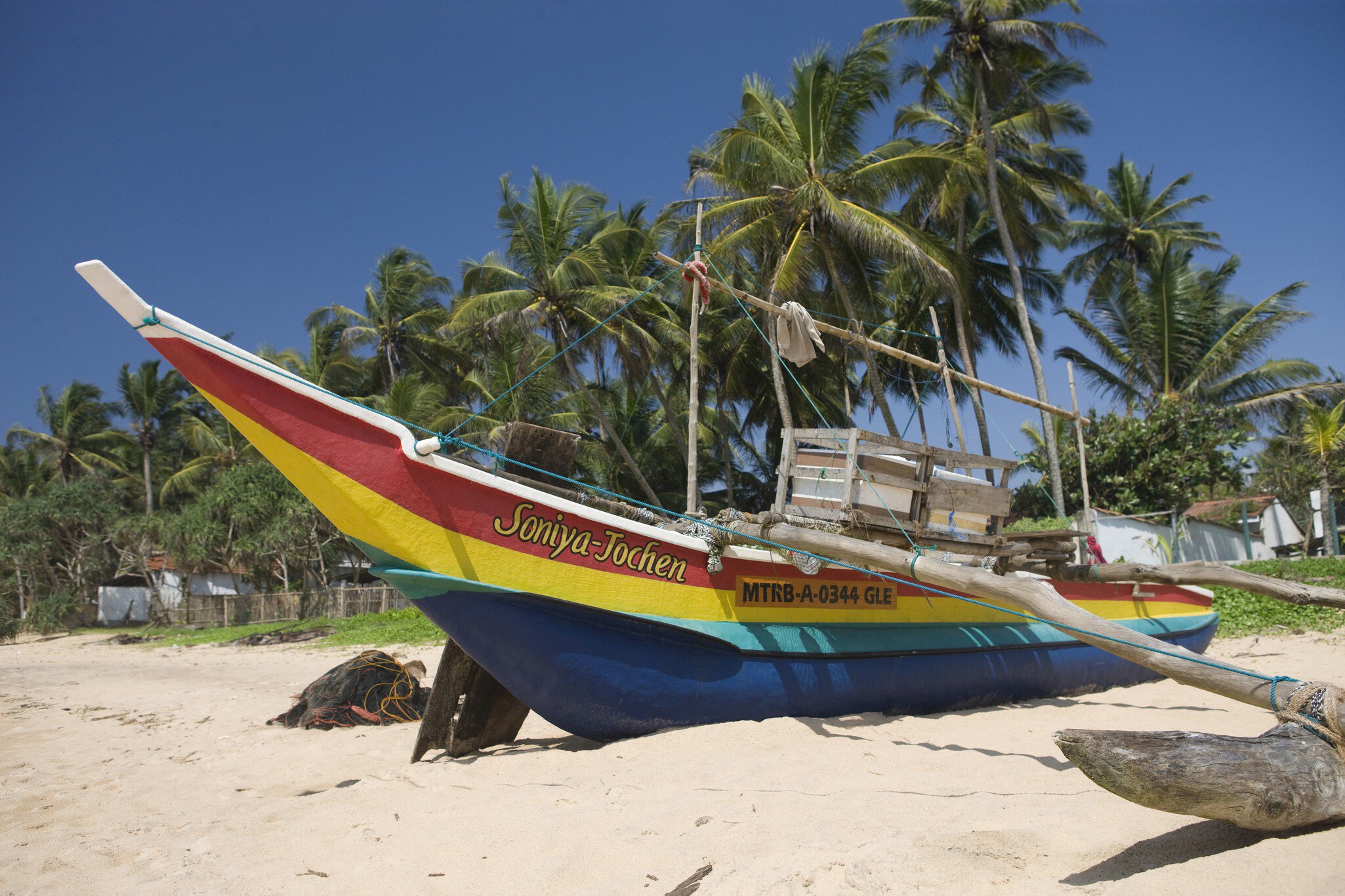 Outrigger on Hikkaduwa Beach,  Sri Lanka