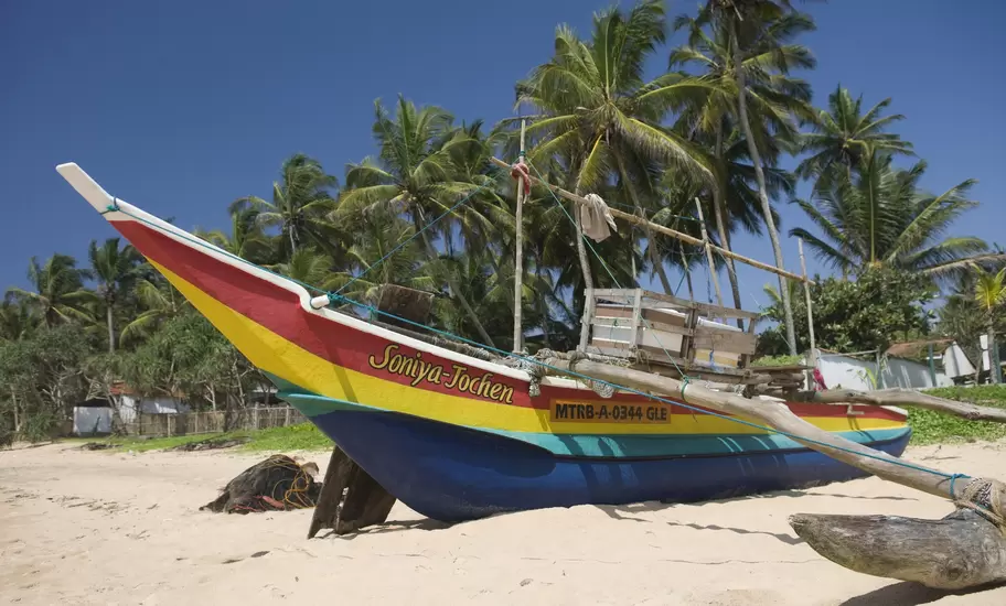 Outrigger on Hikkaduwa Beach,  Sri Lanka