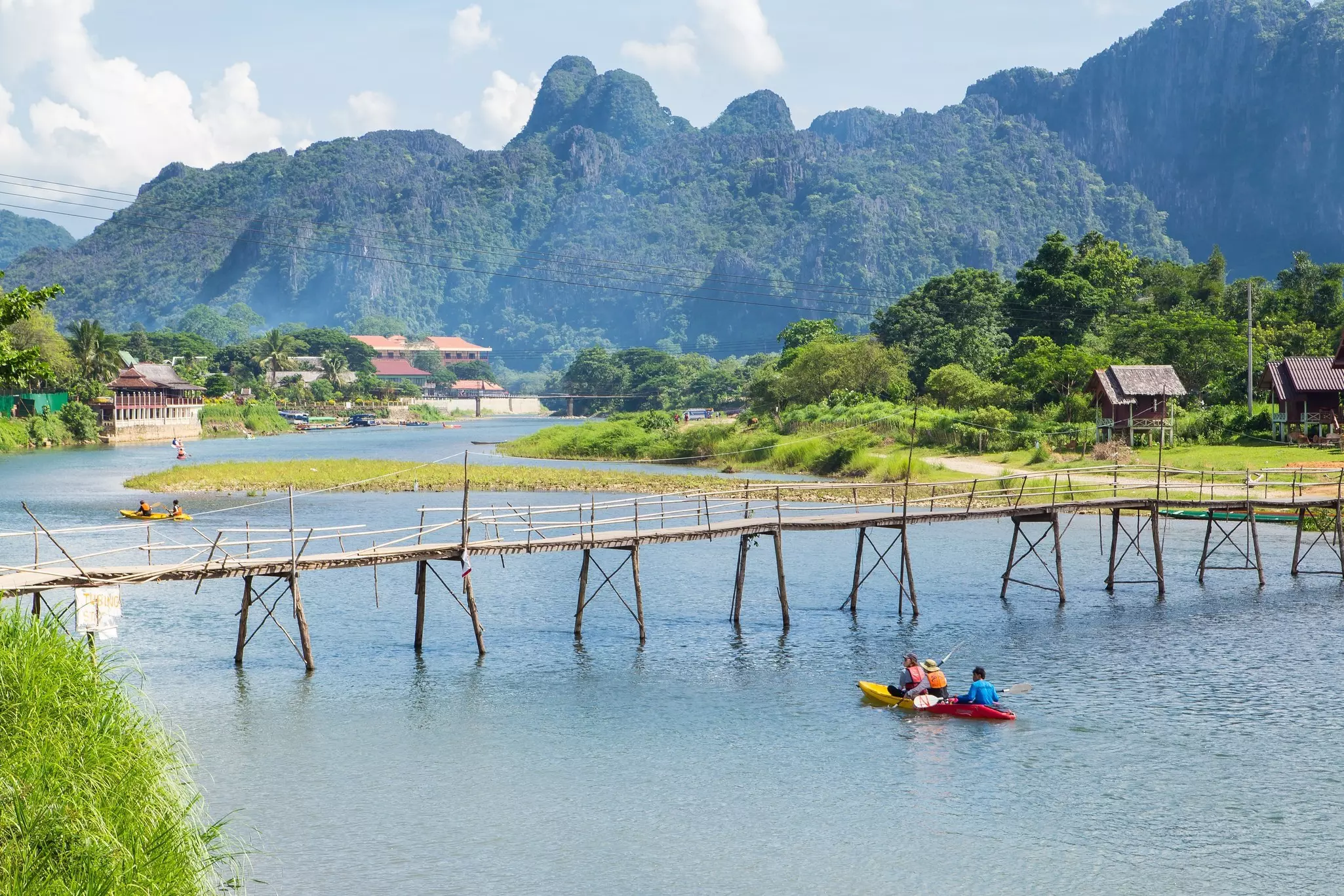 Wooden bridge across Nam Song river at Vang Vieng, Laos