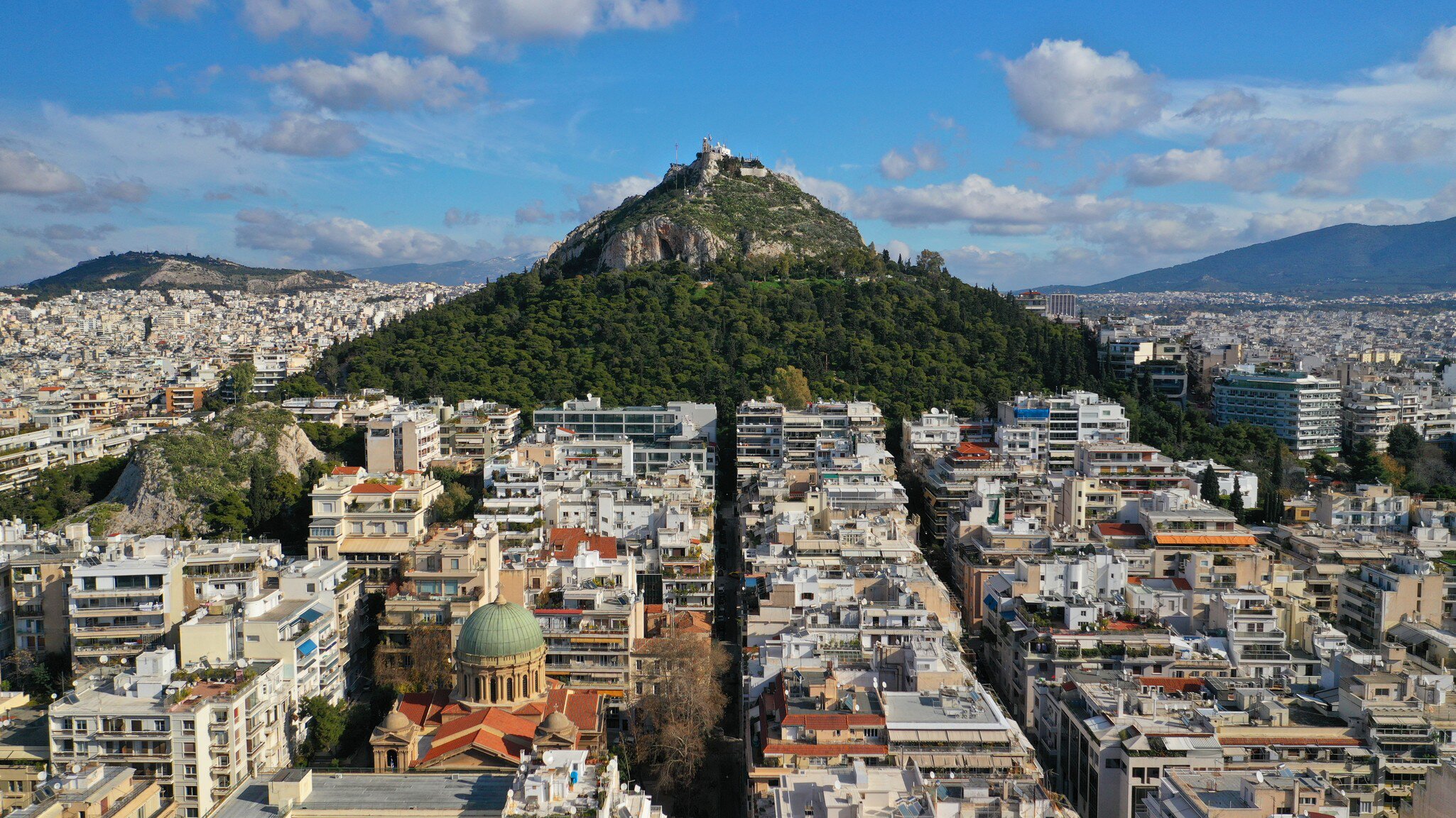View of Lykavittos Hill in Athens, Greece.