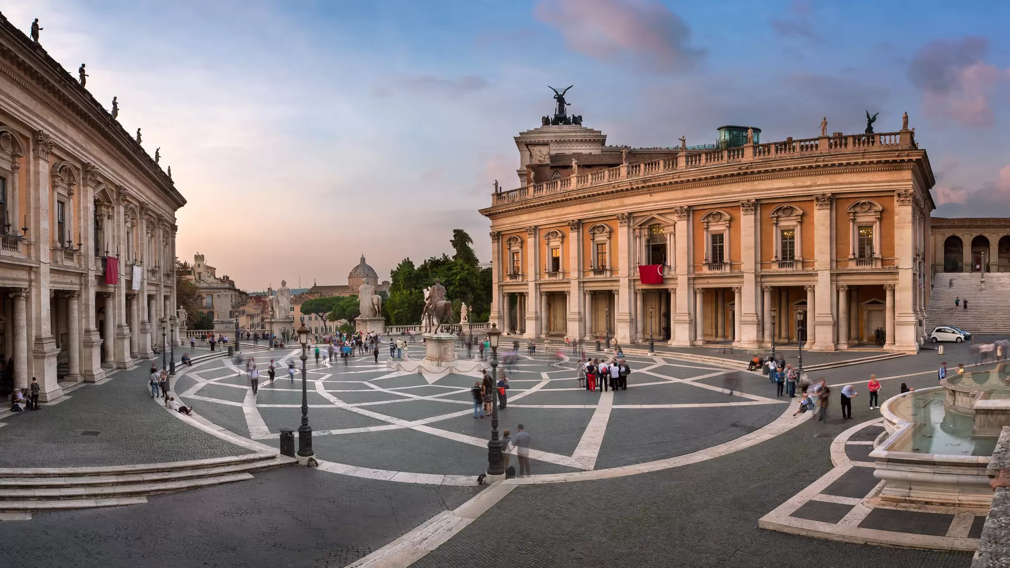 A square lined with large classical museum buildings